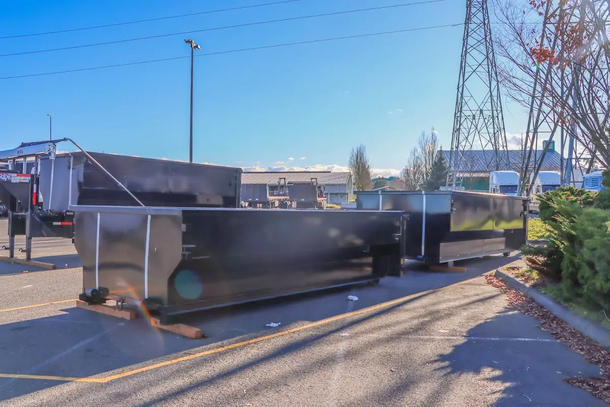 Roll-off dumpster ready for waste disposal at job site for Yard Waste Dumpster Rental in Old Jamestown
